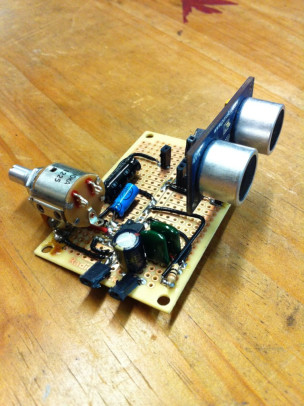 'Theramin' like-device that uses sonic rangefinders to adjust pitch (w/on board audio amplifier)